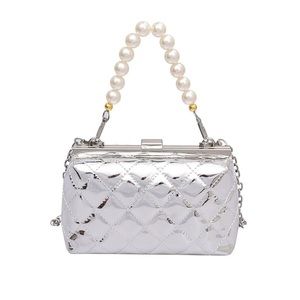 Silver purse with a dainty pearl strap.